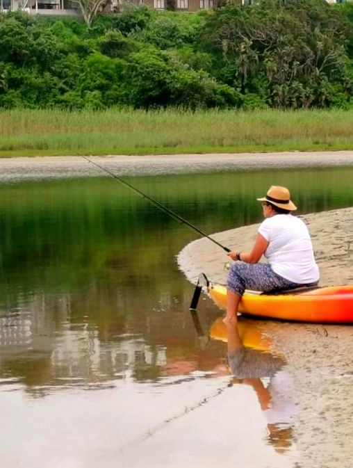 Fishing from the bank of the Chintsa lagoon