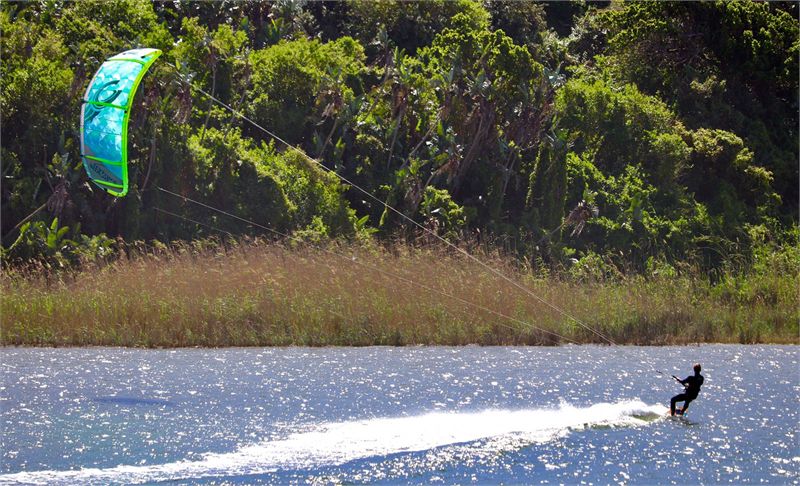 A kiteboarder on the water at Chintsa